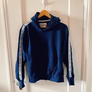 TORY BURCH SPORT navy hoodie with logo detail on sleeves.  Size XS.